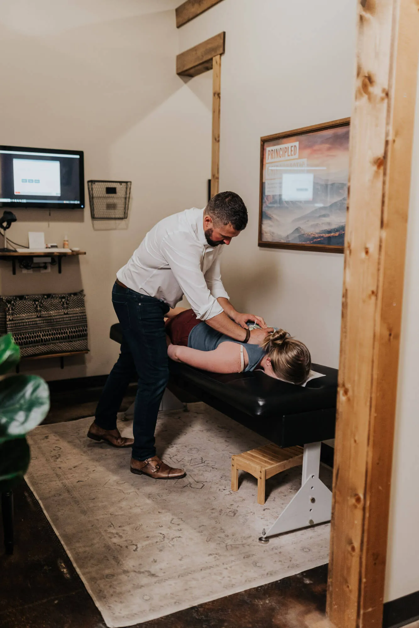 Chiropractor working on a patient's neck